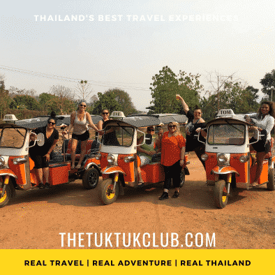 Three Tuk Tuks with 6 women smiling and standing by them after having learned to drive the Tuk Tuks