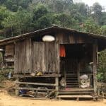 A small wooden home in a Karen village high in the mountains of Thailand